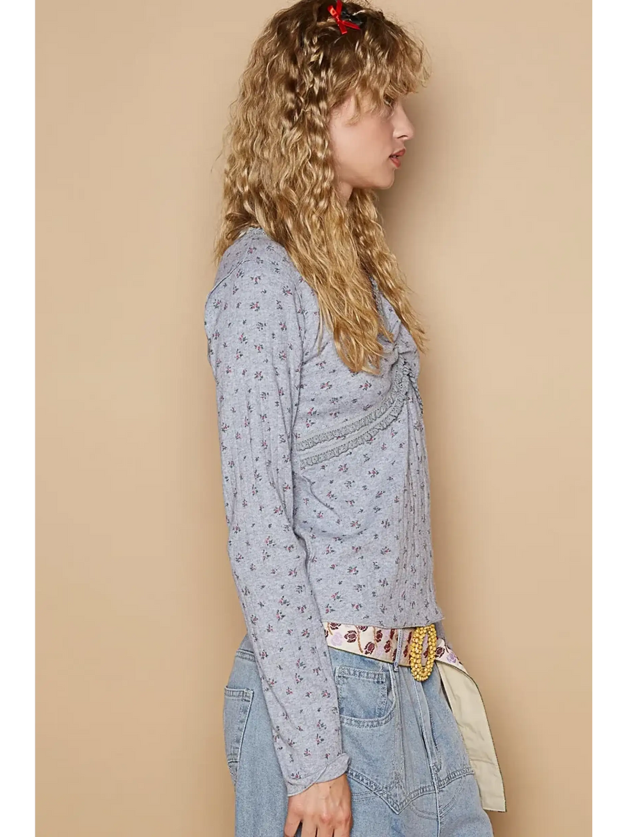 Trendsi chic long sleeve beachwear shirt in light blue with floral print worn by model