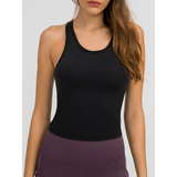 Trendsi black chic racerback yoga tank for women styled with purple leggings