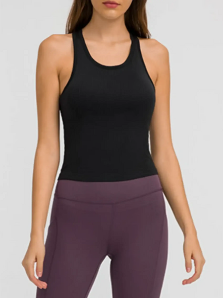 Trendsi black chic racerback yoga tank for women paired with purple leggings