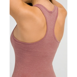 Back view of a chic racerback yoga tank for women in mauve color by Trendsi showing soft fabric texture