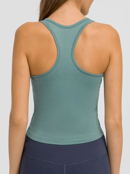 Back view of chic racerback yoga tank for women in sage green ribbed fabric by Trendsi