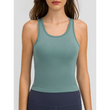 Trendsi chic racerback yoga tank for women in muted green with ribbed texture and fitted design