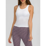 Trendsi chic racerback yoga tank for women in white, styled with purple leggings for active wear