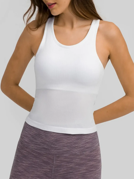 Trendsi chic racerback yoga tank for women in white ribbed fabric paired with purple leggings
