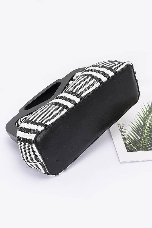 Black and white patterned chic resort evening handbags with unique handle design by Babe Beachwear