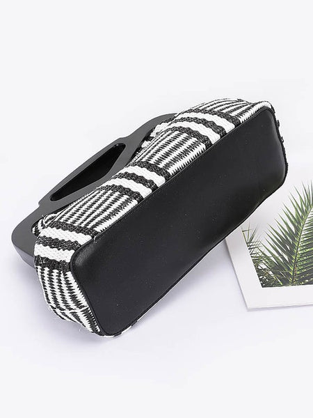 Black and white patterned chic resort evening handbags with unique handle design by Babe Beachwear