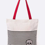 Babe Beachwaer bag with chic skull design resort bag featuring black stripes and red handles