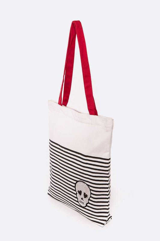 Babe Beachwear chic skull design resort bag with black stripes and red shoulder straps