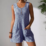 Babe Beachwear chic summer leisurewear romper in blue textured fabric with front buttons and pockets