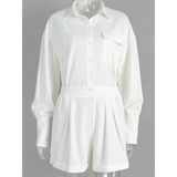 Trendsi classy long sleeve romper in white with button front and chest pockets