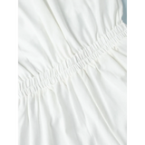 Close-up of white fabric with gathered elastic detail on a Classy Long Sleeve Romper from Trendsi