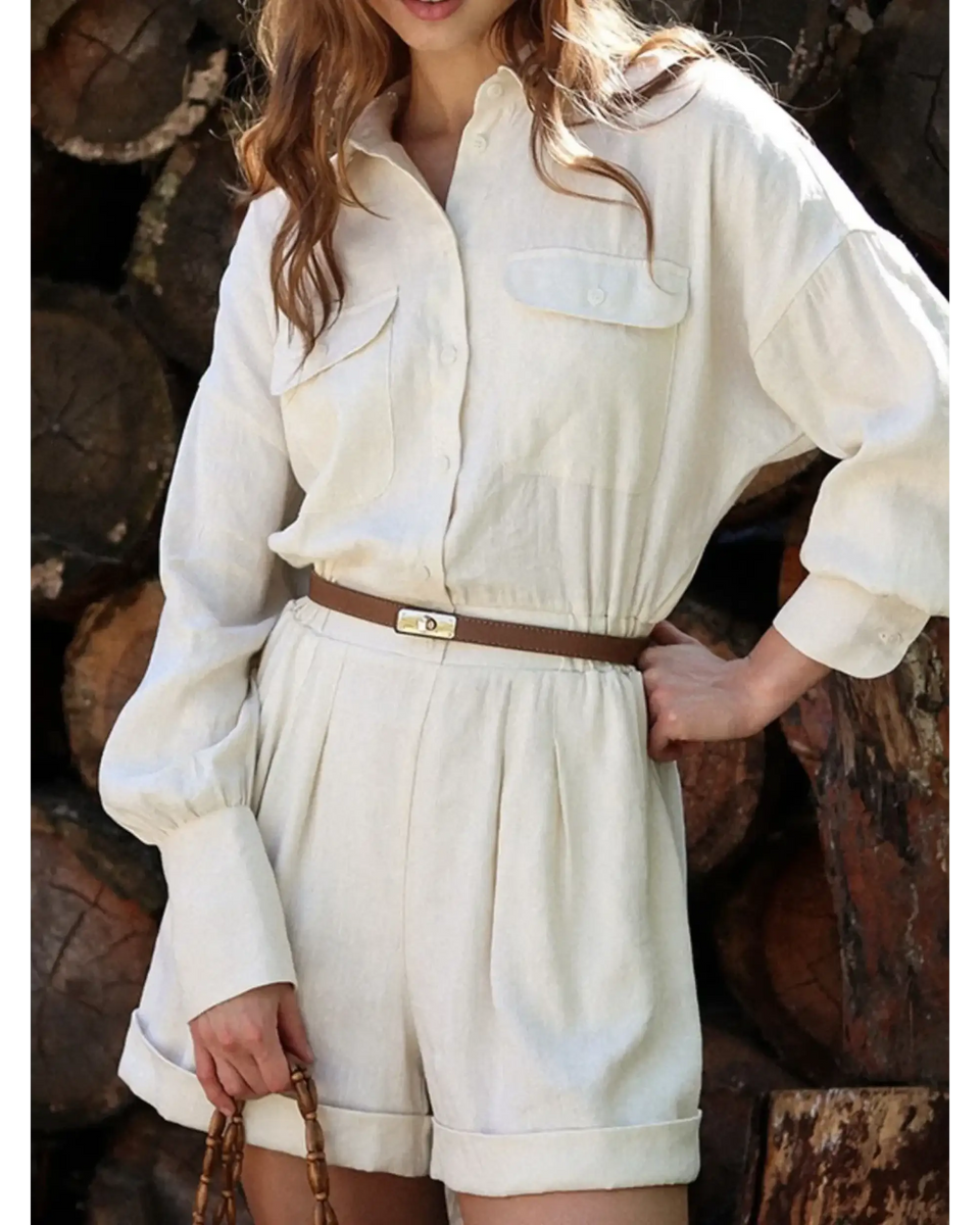 Trendsi classy long sleeve romper in cream with front pockets and a brown belt