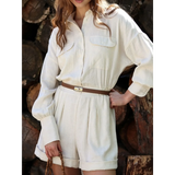 Trendsi classy long sleeve romper in cream with front pockets and a brown belt