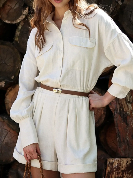 Trendsi classy long sleeve romper in cream with front pockets and a brown belt