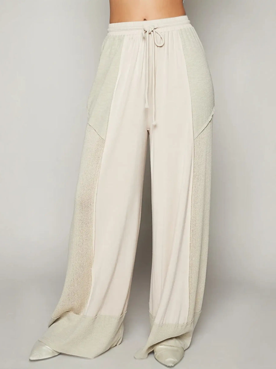 Beige cotton cream wide leg pants with drawstring waist for cool summer looks