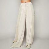 Beige cotton cream wide leg pants with drawstring waist for cool summer looks