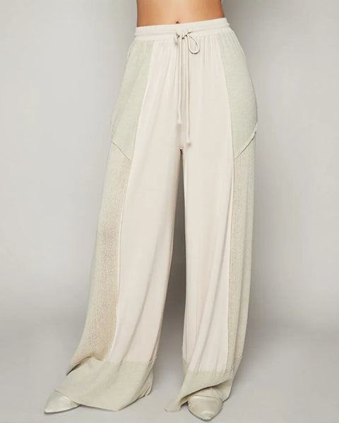 Beige cotton cream wide leg pants with drawstring waist for cool summer looks