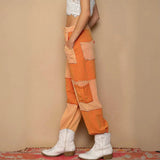 Orange patchwork pants with drawstring pocketed contrast for a standout cargo look