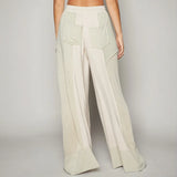 Light-colored cotton cream wide leg pants for effortless summer style