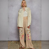Woman wearing vintage inspired lightweight summer shirt in bohemian style