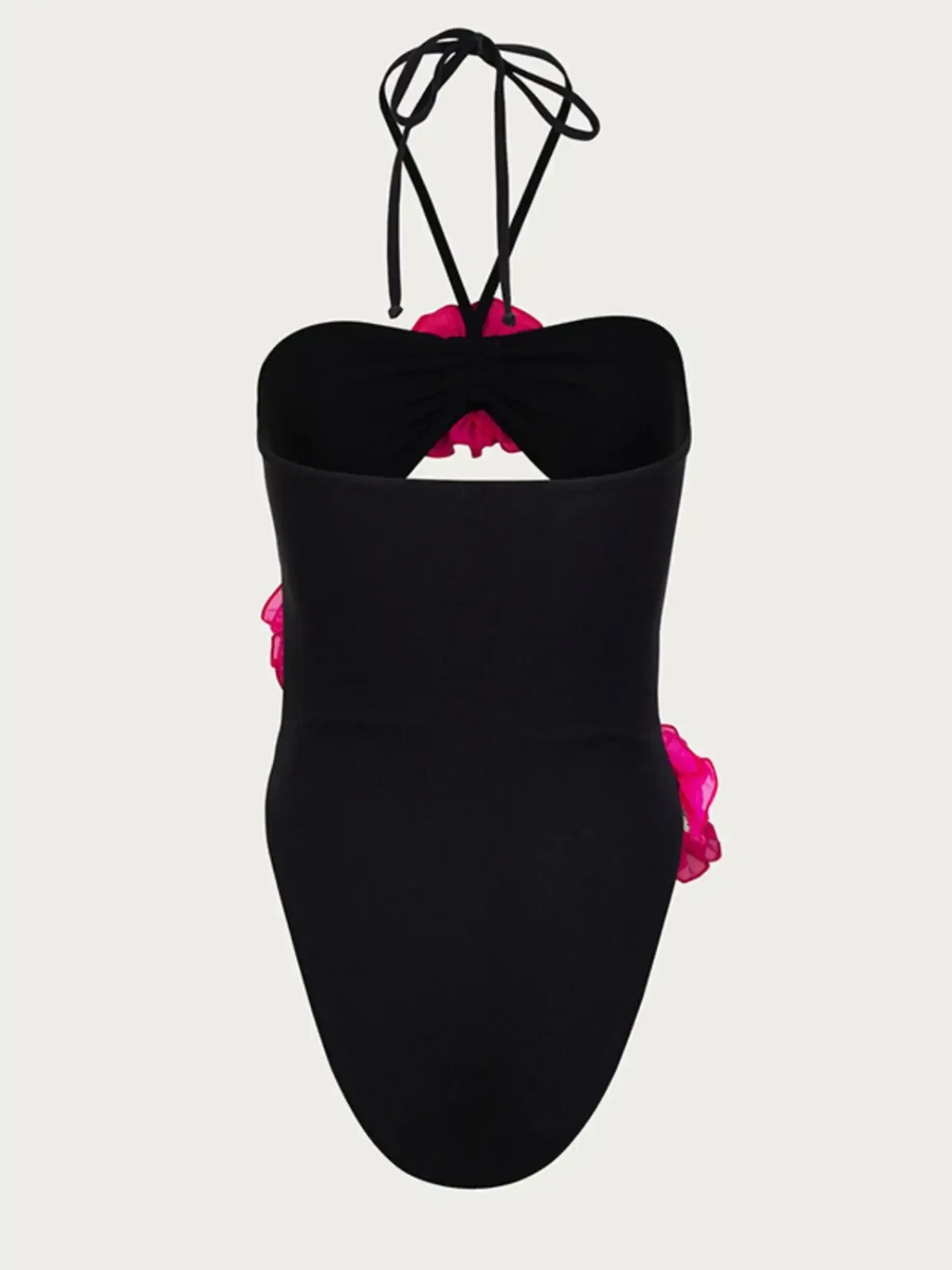 Beach Babes color-block one piece bathing suit in black with pink ruffle details and halter straps