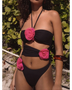 Beach Babes color-block one piece bathing suit in black with pink floral accents and cutout design