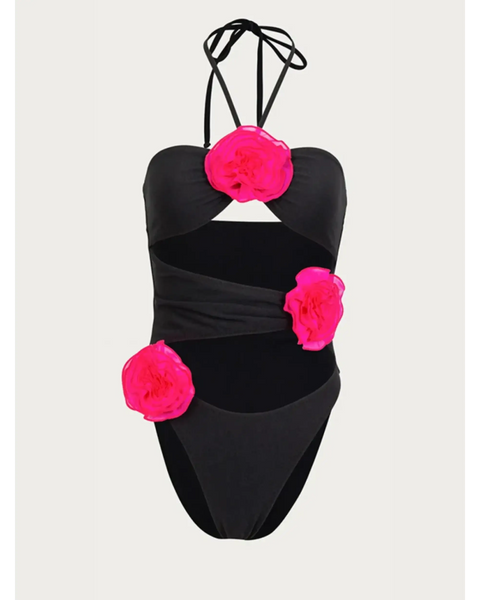 Beach Babes color-block one piece bathing suit in black with bright pink floral accents and halter neck straps