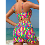 Colorful highwaisted bikini for women with vibrant abstract pattern on beach background