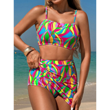 Colorful highwaisted bikini for women with vibrant abstract pattern by Trendsi on beach