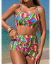 Colorful highwaisted bikini for women with vibrant abstract pattern by Trendsi on beach