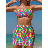 Colorful highwaisted bikini for women with vibrant abstract pattern worn on the beach by Trendsi