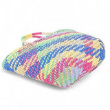 Colorful straw beach tote bag by Babe Beachwaer with a vibrant woven pattern perfect for summer