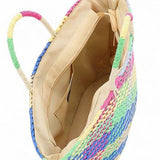 Colorful straw beach tote bag with spacious interior and dual handles from Babe Beachwear