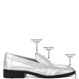 Babe Beachwear comfortable slip-on loafers for travel in silver with low block heel and penny strap detail