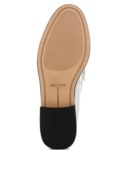 Sole view of Babe Beachwear comfortable slip-on loafers for travel with black heel grip and stitched detailing