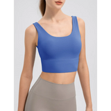 Babe Beachwear comfortable summer exercise tank in blue worn with gray leggings