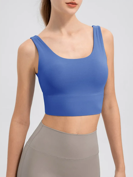 Babe Beachwear comfortable summer exercise tank in blue worn with gray leggings