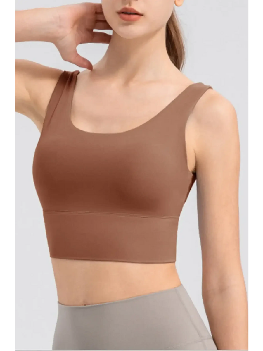 Babe Beachwear brown active tank worn by woman comfortable summer exercise tank for workouts