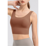 Babe Beachwear brown active tank worn by woman comfortable summer exercise tank for workouts