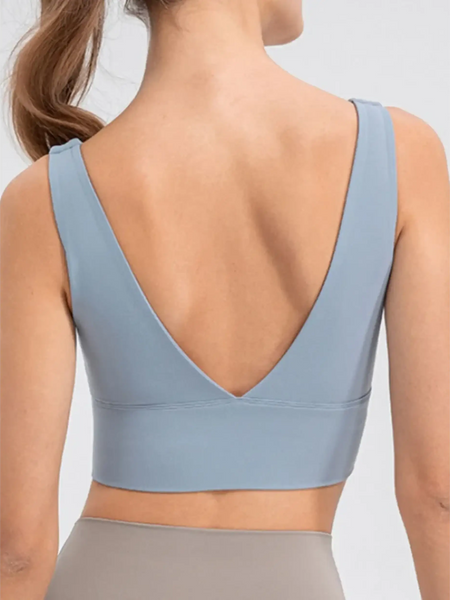 Back view of Babe Beachwear comfortable summer exercise tank in light blue with deep V-cut and wide straps