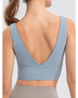 Back view of Babe Beachwear comfortable summer exercise tank in light blue with deep V-cut and wide straps