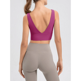 Babe Beachwear comfortable summer exercise tank in purple with deep back V design shown from rear
