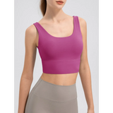 Babe Beachwear comfortable summer exercise tank in pink worn with high-waisted workout leggings