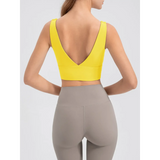 Babe Beachwear yellow active tank with deep V back designed as a comfortable summer exercise tank