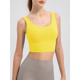 Babe Beachwear yellow comfortable summer exercise tank worn with high-waisted gray leggings