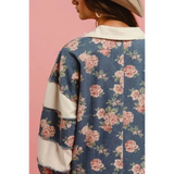 Babe Beachwear floral contrast collar summer romper with pink roses on blue fabric