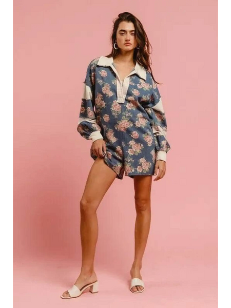 Babe Beachwear contrast collar summer romper with floral print worn by model on pink background