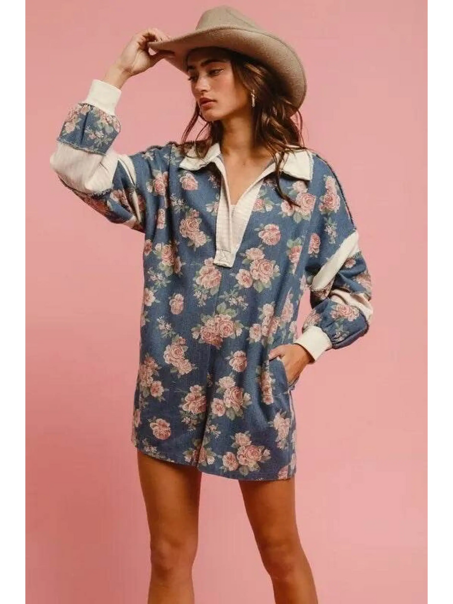 Babe Beachwear contrast collar summer romper with floral print and long sleeves worn with a hat