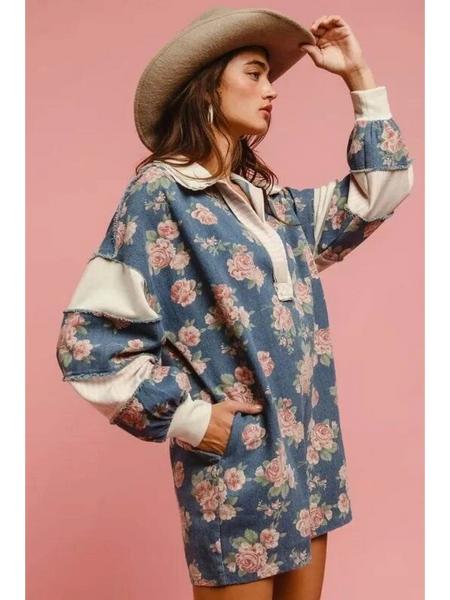 Babe Beachwear contrast collar summer romper with floral print and long sleeves worn with a wide brim hat