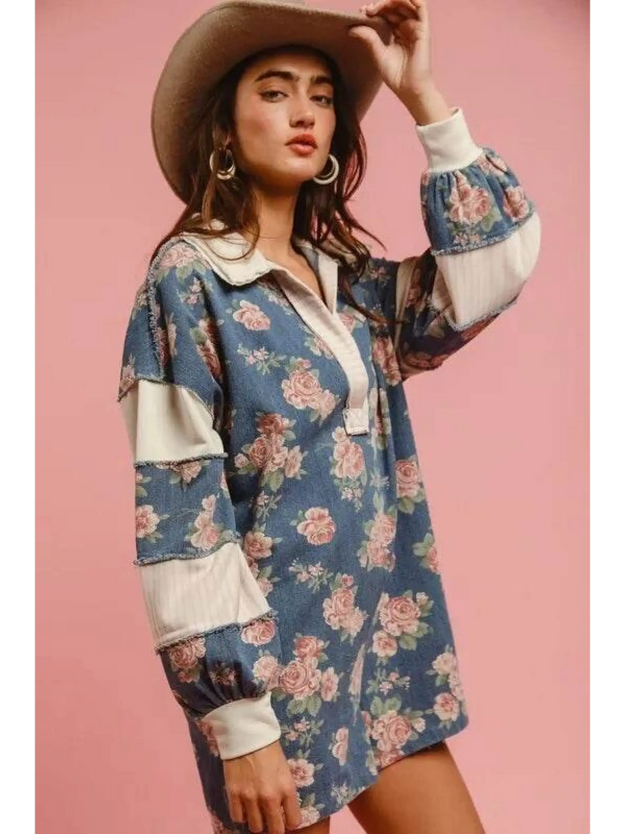 Babe Beachwear contrast collar summer romper with floral print and long sleeves on model